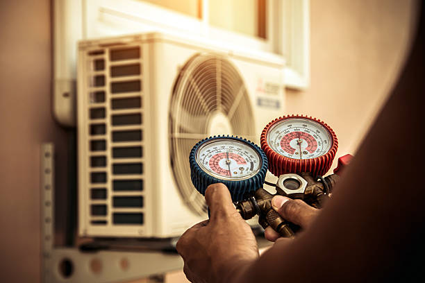 Professional Hvac technician working in Covington, TN